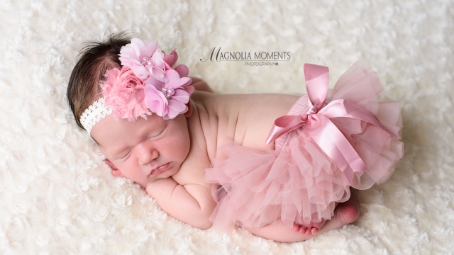 Cradled in Light: Capturing the Beauty of Newborn Photography